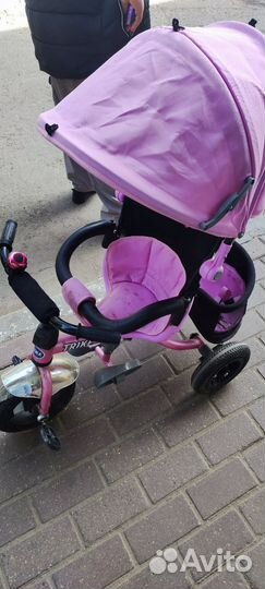 Трехколесный велосипед с ручкой