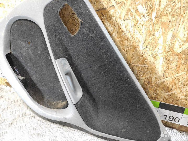 Обшивка двери задней правой Opel Astra F