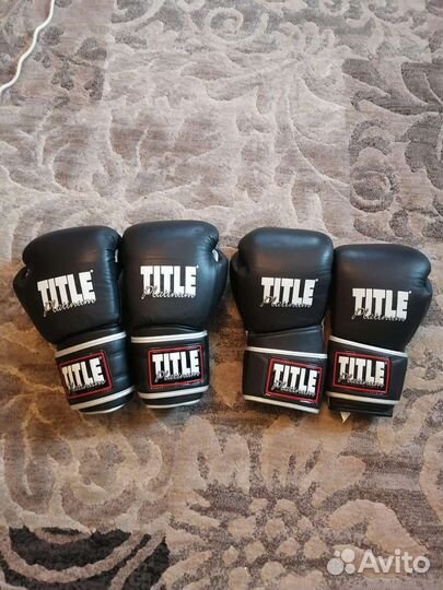 Боксерские перчатки title platinum 14oz
