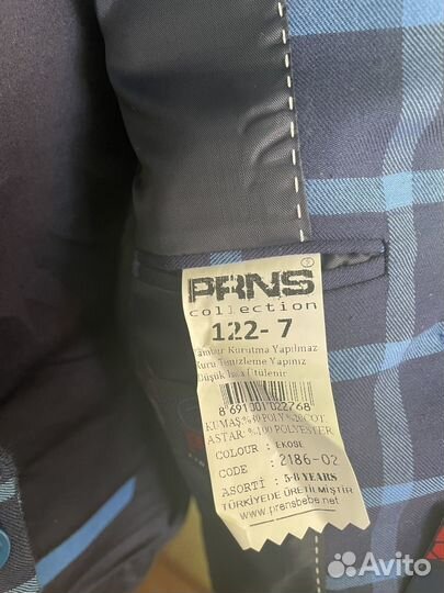 Костюм для мальчика новый 122-7лет