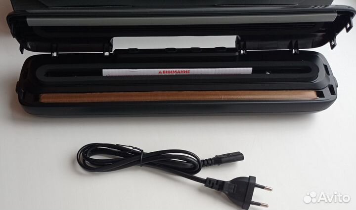 Вакуумный упаковщик