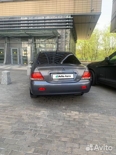 Mitsubishi Lancer 1.3 МТ, 2005, 193 000 км