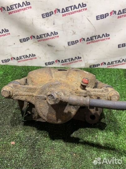 Суппорт тормозной передний правый Toyota Carina E