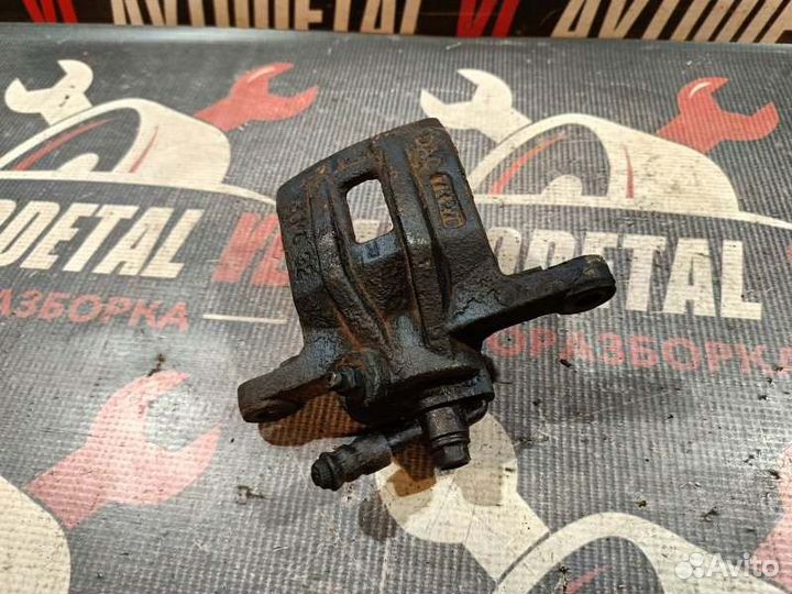 Суппорт тормозной задний правый Chevrolet Lacetti