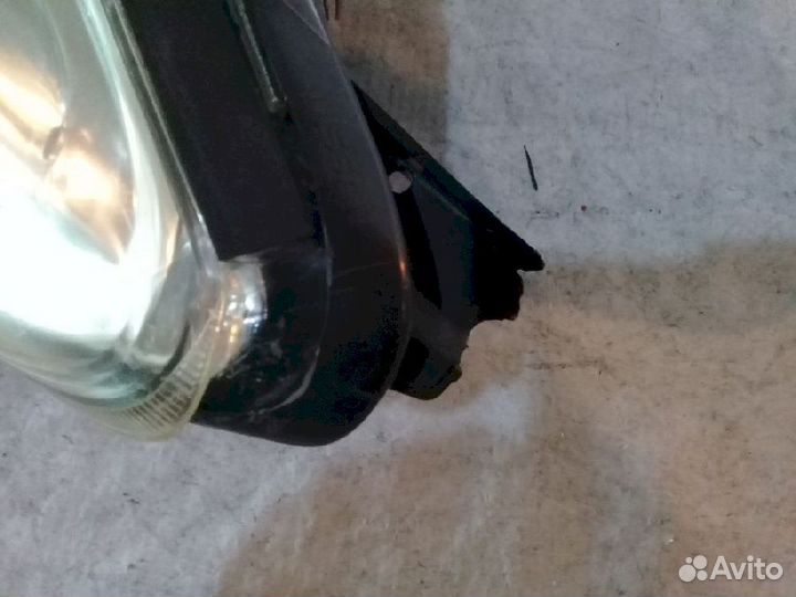 Фара левая H005 Nissan Note E11 брак крепления