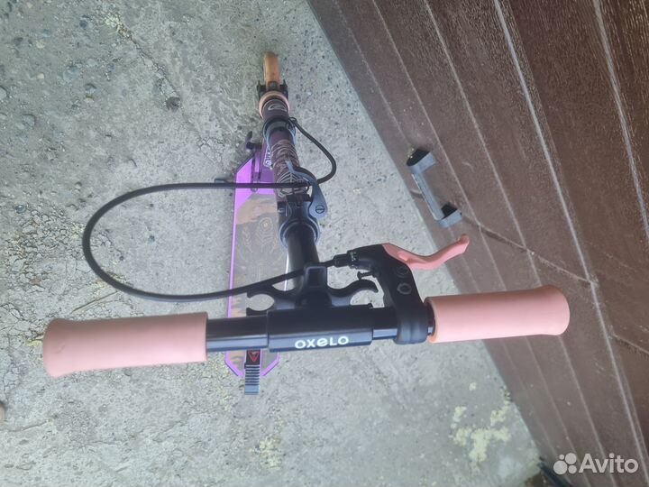 Самокат с ручным тормозом и подножкойй