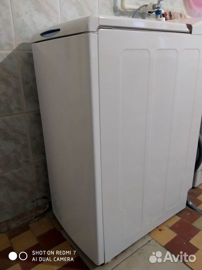 Стиральная машина с вертикальной загрузкой