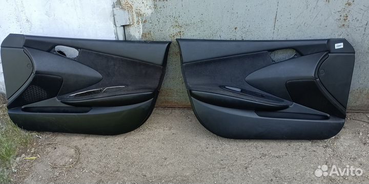 Обшивка передних дверей nissan p12