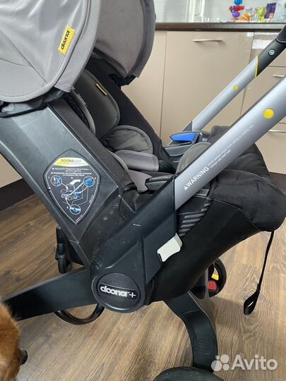 Коляска автокресло doona с базой isofix