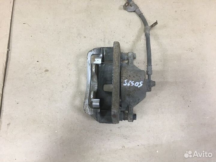 Суппорт тормозной передний правый Kia Magentis MG