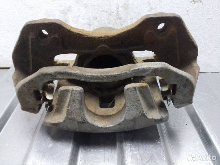 Суппорт передний правый Mitsubishi Lancer 9