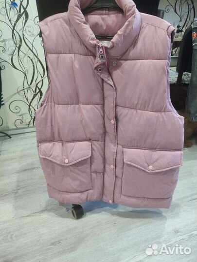 Розовый жилет