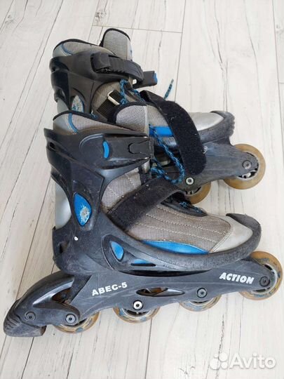 Роликовые коньки