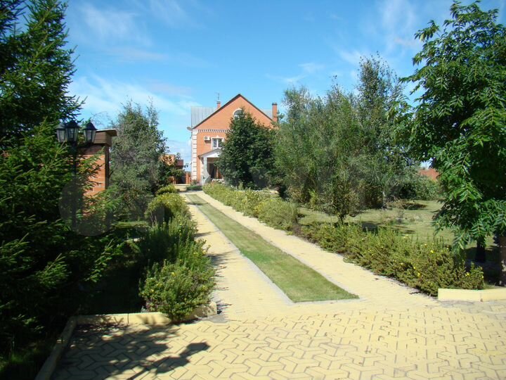 Коттедж 362 м² на участке 15 сот.