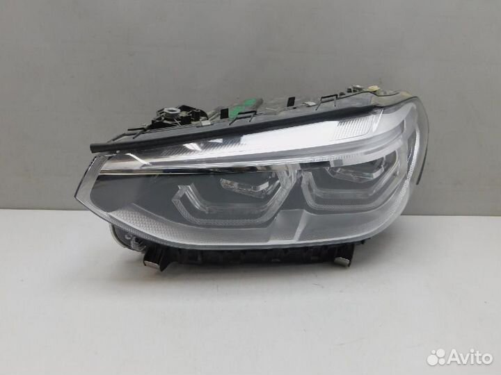 Фара левая BMW X3