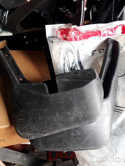 Брызговики передние renault Logan 2010