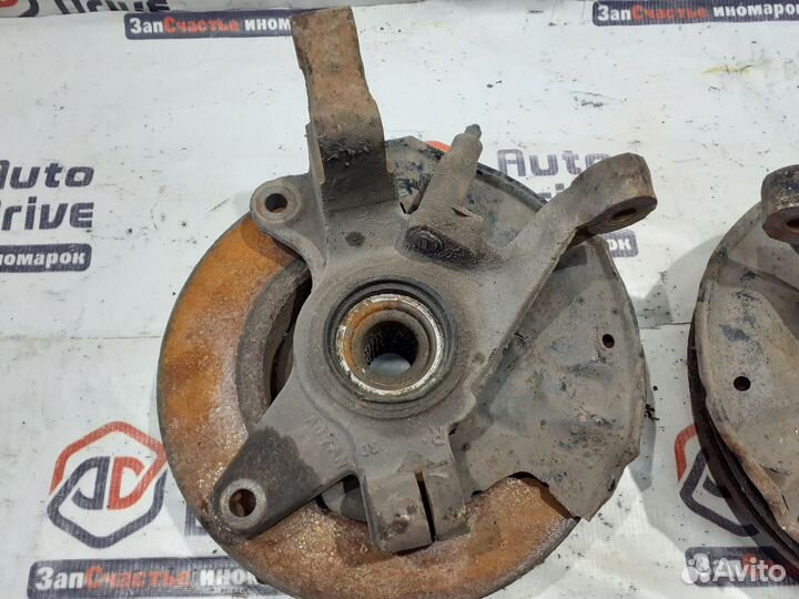 Kia Spectra кулак поворотный левый.правый