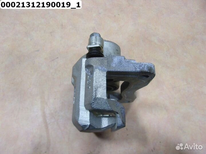 Subaru Forester Суппорт тормозной передний левый