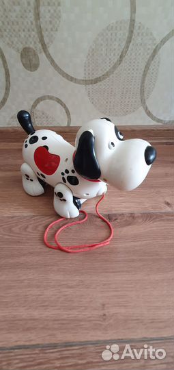 Музыкальная собака-каталка