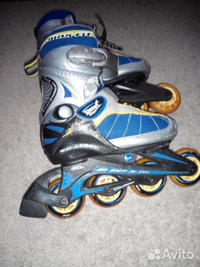 Роликовые коньки