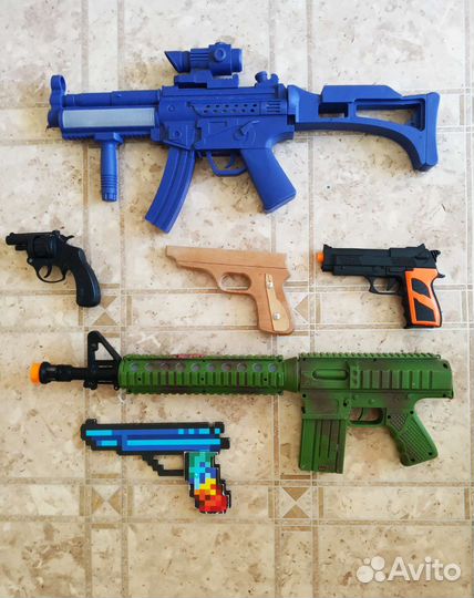 Игрушки пистолеты