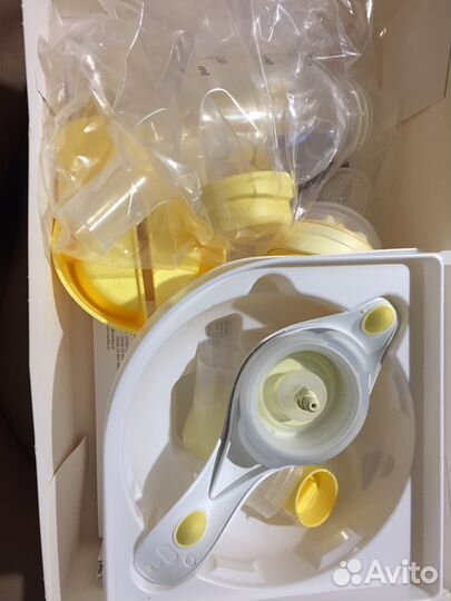 Молокоотсос Medela harmony с соской Calma и бутыло