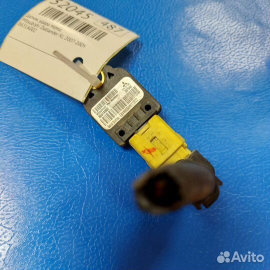 Датчик удара передний Mitsubishi Outlander Xl