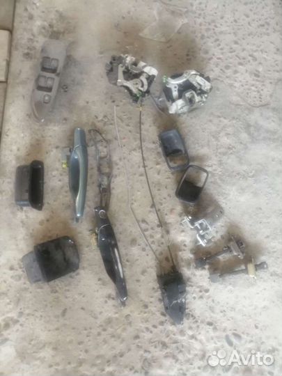 Обшивка двери салон лансер 9