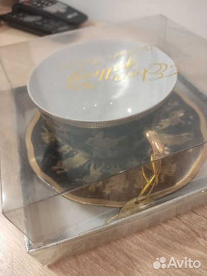 Чашка с блюдцем и ложкой