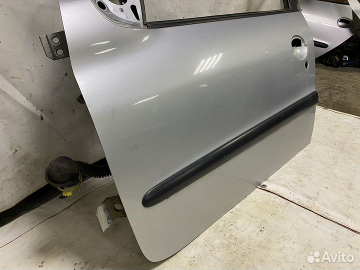 Дверь передняя левая (2008 год ) Peugeot 206