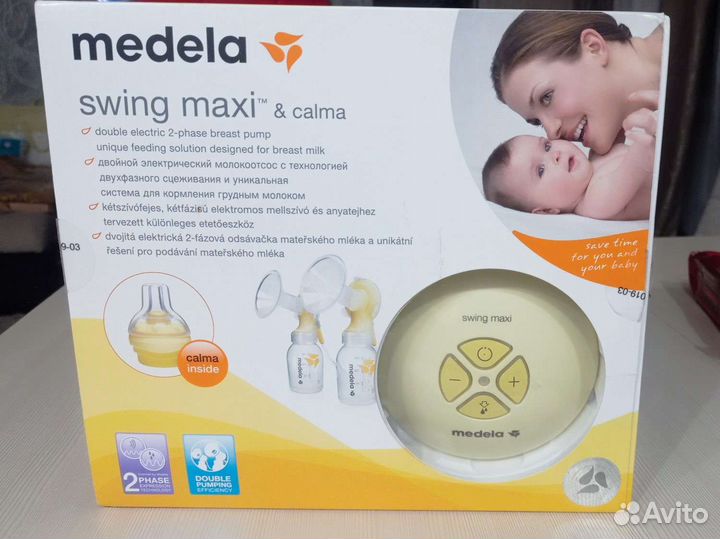 Молокоотсос medela электрический