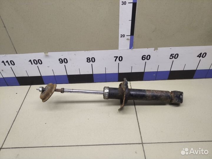 Амортизатор задний Almera N16 2000-2006