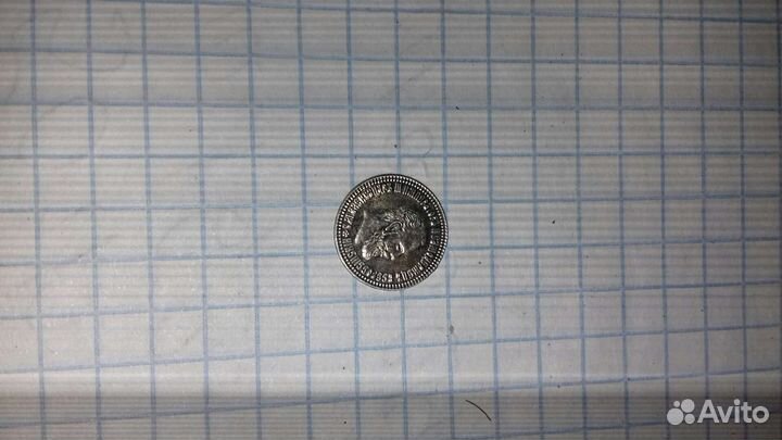 Монета.На монете цифры Аq 999