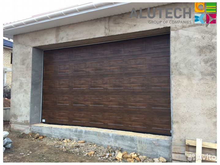 Секционные ворота для гаража alutech