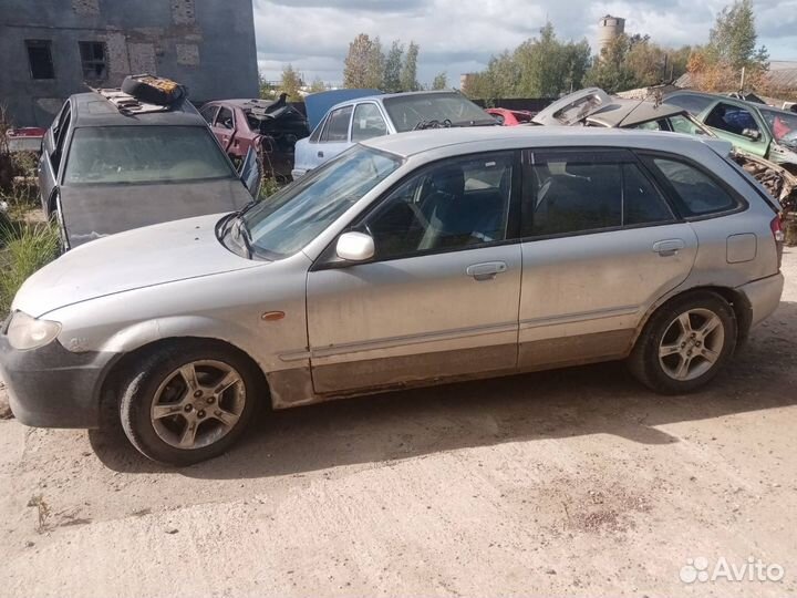 Поводок дворников передний Mazda 323 BJ
