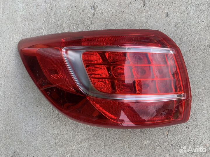 Задний левый наружный фонарь Kia Sportage 3
