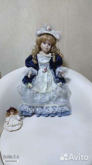 Коллекционная фарфоровая кукла