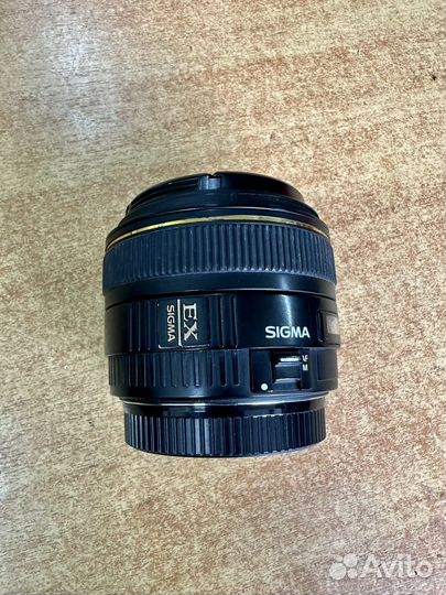 Объектив Sigma 30 mm 1 4