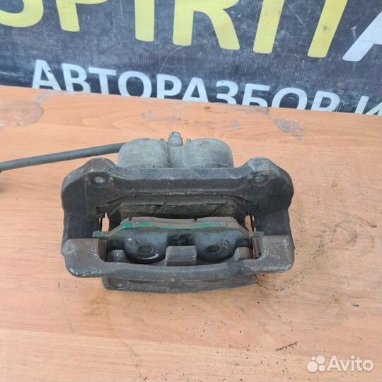 Суппорт тормозной передний правый Kia Mohave 1