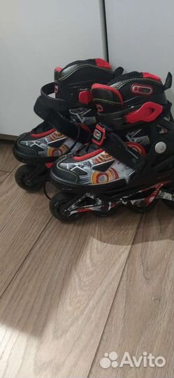 Роликовые коньки