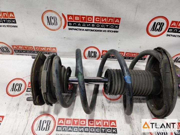 Стойка передняя левая toyota estima