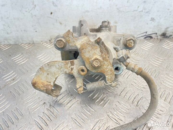 Суппорт тормозной задний левый Toyota Corolla