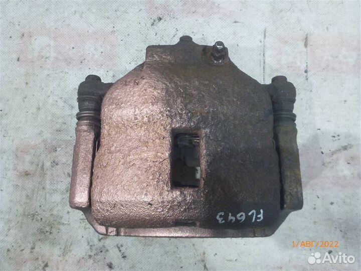 Суппорт передний левый Nissan Almera N16 QG15DE