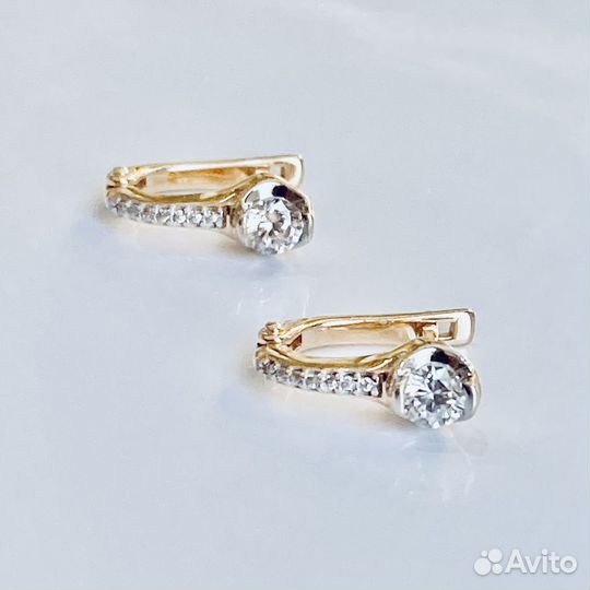 Золотые серьги с камнем