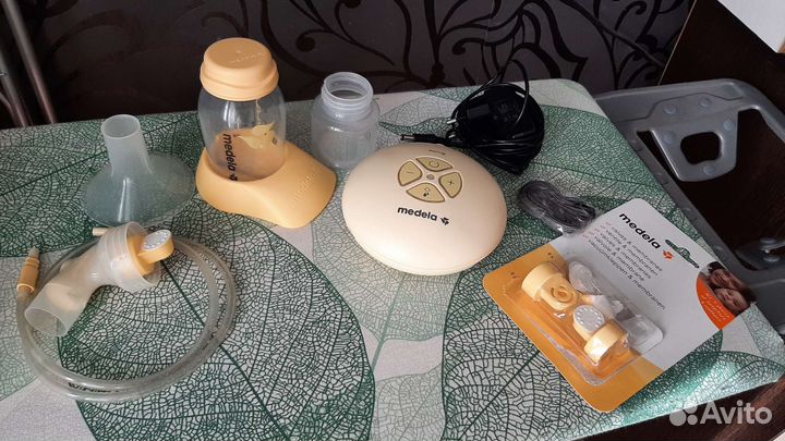 Молокоотсос medela электрический
