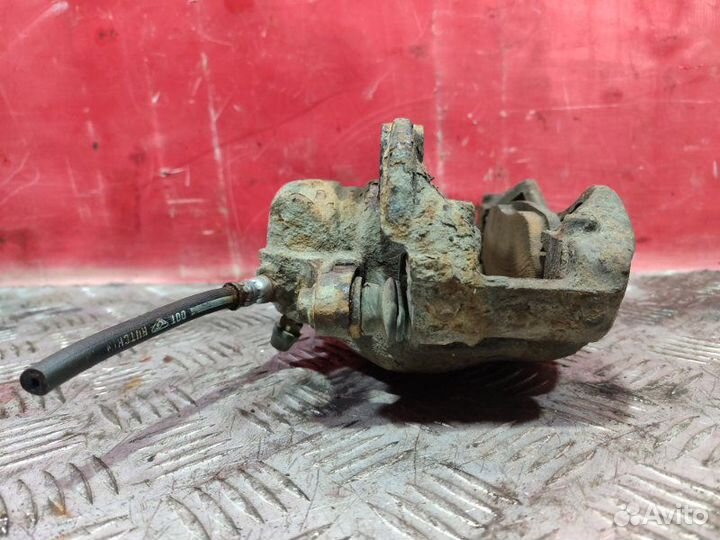 Суппорт тормозной передний левый Peugeot 308 / 4A