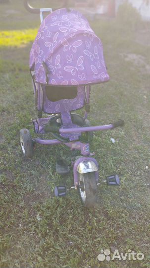 Трехколесный велосипед с ручкой