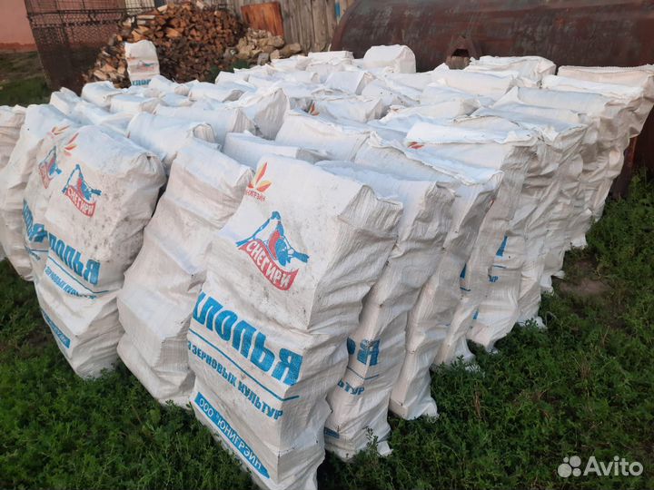 Дрова колотые в мешках