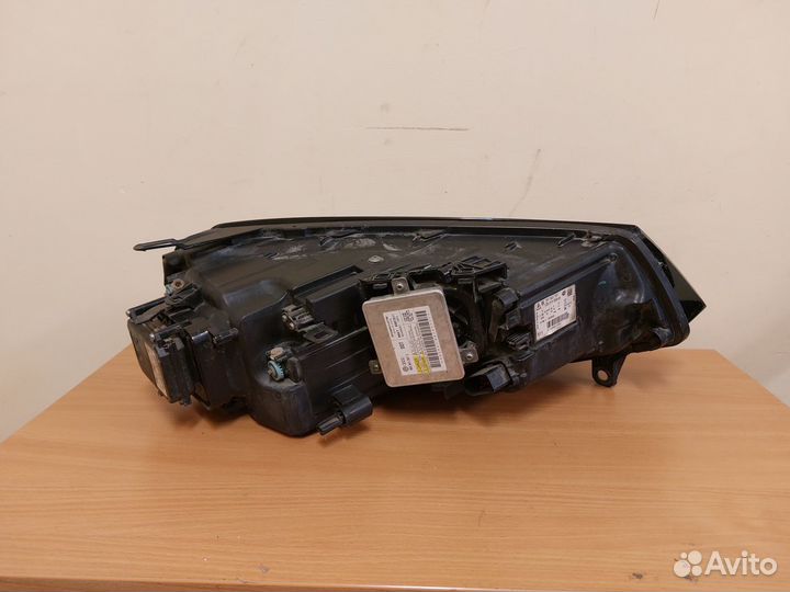 Фара левая Volkswagen Touareg NF 7P1941751