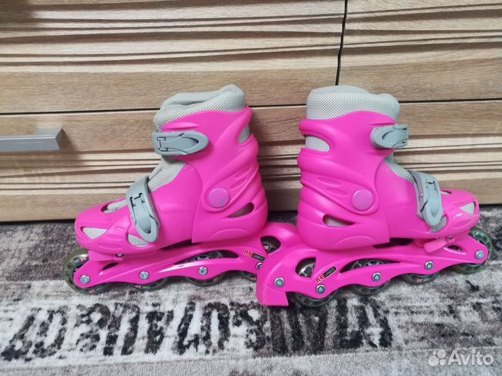 Роликовые коньки